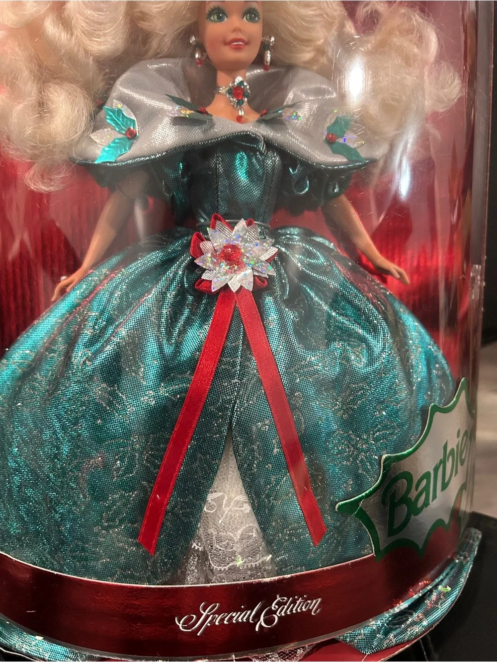 1995 Special Edition Happy Holidays Barbie by Mattel, featuring a distinct emera